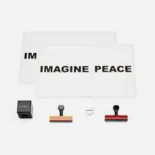 Yoko Ono, A Box of Smile and collection of ephemera, acrylic box with mirror; rubber stamp; printed paper; metal button