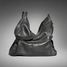 Marilyn Levine, Tribune Bag, 1982, hand-built and glazed stoneware, metal