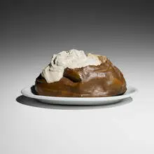 Baked Potato (from 7 Objects in a Box) by Claes Oldenburg, 1966, hand-painted cast aluminum; Shenango porcelain, sold Apr 2026