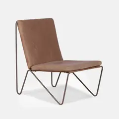 'Bachelor' chair by Verner Panton, the tubular nickel-plated steel frame with a grey leather seat and back pad, sold Apr 2026