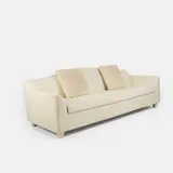 Christian Liaigre, Three-seater sofa, upholstered in ecru calico