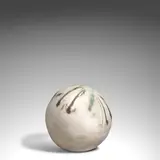 Baby Moon by Toshiko Takaezu, glazed stoneware, patinated iron base, sold Dec 2025