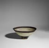 Lucie Rie, Footed Bowl, glazed stoneware, radiating lines of sgraffito, manganese-glazed foot and lip, impressed artist's seal 'LR'