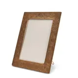 "ZODIAC" PICTURE FRAME by Tiffany Studios, New York, New York, early 20th century, gilt bronze, integrated stand, impressed stamp mark "Tiffany Studios New York 92, sold May 2025