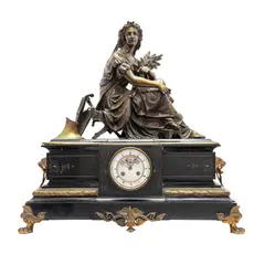 Reloj de Chimenea, FRANCIA, FINALES DEL SIGLO XIX, Mármol negro, decorado con aplicaciones de bronce dorado, a manera de garra y figuras vegetales, remate escultórico con figura de la diosa Ceres; carátula porcelanizada, números romanos; media sonería
