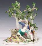 PASTORAL GROUP, SHEPHERD & SHEPHERDESS UNDER TREE by Meissen, sold Jun 2024