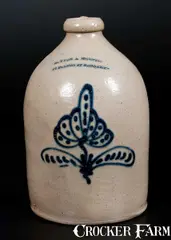Sutton & Huestis, SUTTON & HUESTIS / BROOKLYN Stoneware Advertising Jug w/ Slip-Trailed Floral Decoration, circa 1845, Stoneware