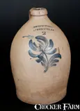 COWDEN & WILCOX / HARRISBURG, PA Two-Gallon Stoneware Jug w/ Tulip Decortion by Cowden & Wilcox, circa 1865, Stoneware, sold Jul 2015