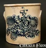 J. & E. NORTON / BENNINGTON, VT 5 Gal. Stoneware Crock with Profuse Slip-Trailed Floral Decoration by J. & E. Norton, circa 1855, Stoneware, sold Mar 2014