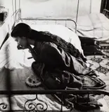 Werner Bischof, Bharat-Natyam dancer Anjali Hora getting ready for a performance, Bombay 1951, 1951, Gelatin silver print, printed c. 1960 on single-weight glossy paper, in very good condition. Photographer's Magnum stamp and "John Hillelson" agency stamp on the reverse