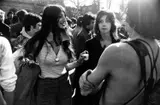 Garry Winogrand, Woman holding dixie cup in park, New York City 1969, 1969, Gelatin silver print, printed c. 1980 on double-weight semi-matte paper c