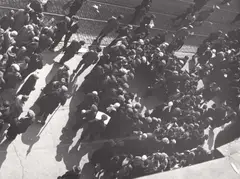 Alexander Rodchenko, Crowd at a street performance, Moscow c. 1932, 1932, Gelatin silver print, printed c. 1960 on double-weight matte Agfa paper, in excellent condition. Photographer's stamp with address in Moscow and his credit stamp in Cyrillic letters on the reverse. In