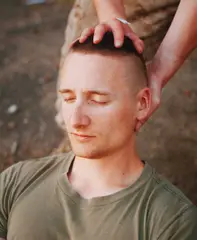 Simon Lehner, Soldiers taking care of each other', from the series 'Men don't play, 2018, Archival pigment print on Hahnemuehle Ultra Smooth paper, mounted on aluminium, in original wooden frame c