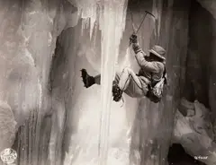 Ernst Baumann, Luis Trenker climbing an ice wall (film still), 1938, Vintage silver print on double-weight glossy paper
