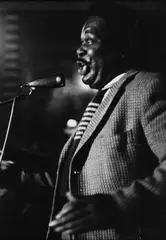 Franz Hubmann, Al 'Fats' Edwards performing at Jazz Club 'Tabarin', Vienna c. 1958, 1958, Vintage silver print on single-weight glossy paper, in good condition, original red wooden frame