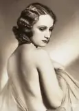 Studio D'ora-Benda, Half-nude, 1928, Vintage silver print on double-weight semi-matte paper, in very good condition. Studio credit "d'Ora BENDA" in the lower negative, "Schostal" agency label with photographer's credit and handwritten en