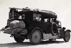 Dust bowl Exodus' (Drought Refugees), California 1936 by Dorothea Lange, 1936, Gelatin silver print, printed in the 1960s on single-weight glossy paper, in good condition (creases on the upper image), sold Nov 2025