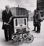 Robert Capa, Organ grinder in the Russian zone, Berlin 1945
