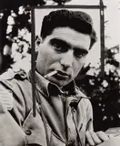 George Rodger, Robert Capa during the allied liberation of Italy, Naples 1943, 1943, Gelatin silver print, printed in 1954 to illustrate the news of Robert Capa's death, on single-weight glossy paper