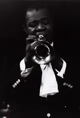 Dennis Stock, Louis Armstrong, from the series 'Jazz Street', USA 1958, 1958, Gelatin silver print, printed in the 1970s on double-weight semi-matte paper, in very good condition. Photographer's Magnum copyright stamp, handwritten negative no. "58-4-166/26" in blue ink and "Lou