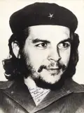 Julio Bello, Ernesto Che Guevara, Havana 1959, 1959, Vintage silver print on double-weight matte paper, in good condition. Che Guevara's handwritten dedication in blue ink "Para la familia Boti con saludos revolucionarios Che" (engl.: With revolutionary