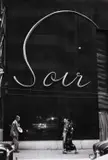 Marc Riboud, Street scene in Tokyo, Japan 1958, 1958, Vintage silver print on single-weight glossy paper, in very good condition. Photographer's Magnum stamp and "Please return" stamp from Magnum Zurich, negative number "58-12-1648/13" both stamped and h