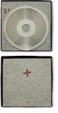 Joseph Beuys, Sun Disc, 1973, Record matrix (nickel-plated copper) with die-cut hole, felt pads stamped with brown paint, in box,