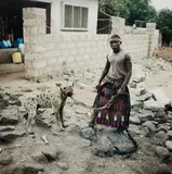 Mohammed Rabiu with Jamis, Asaba, Nigeria from The Hyena Men II by Pieter Hugo, 2007, Chromogenic print, sold Apr 2016