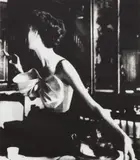 Lillian Bassman, Across the Restaurant, Barbara Mullen, dress by Jacques Fath, Le Grand Vefour, Paris, 1949, Gelatin silver print, printed later