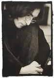 Ethan Russell, John Lennon Listening to the 'White Album,' London, 1968, Platinum palladium print, printed later