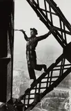 Marc Riboud, Painter on the Eiffel Tower, Paris, France