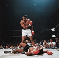 Neil Leifer, Muhammad Ali reacts after his first round knockout of Sonny Liston during the 1965 World Heavyweight Title fight at St. Dominic’s Arena, Lewiston, Maine, 1965, Chromogenic print, printed later