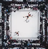 Neil Leifer, Aerial of Muhammad Ali victorious after his round two knockdown of Cleveland Williams during the 1966 World Heavyweight Title fight at the Astrodome, Houston, Texas, November 14, 1966, Chromogenic print, printed later