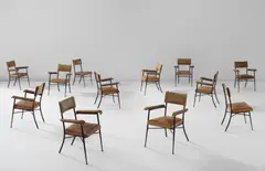Set of twelve chairs by Jacques Adnet, 1950s, Leather, painted steel, brass, sold Jun 2016