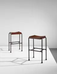 Pierre Chareau, Pair of bar stools, circa 1926, Mahogany, painted steel, painted wood