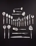 Tapio Wirkkala, "Tapio" flatware service for 12, designed 1957, Forks, spoons, ladles, and two serving pieces: silver. Knives and other serving pieces: sterling silver, stainless steel