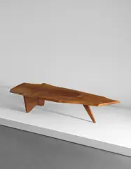 "Slab" coffee table by George Nakashima, 1958, American black walnut, one East Indian rosewood butterfly key, sold Jun 2016