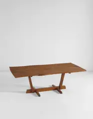 "Conoid" dining table by George Nakashima, 1976, Book-matched American black walnut, four East Indian rosewood butterfly keys, sold Jun 2016