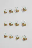 Set of twelve wall-mounted coat hangers by Fontana Arte, circa 1960, Glass, brass, sold Jun 2016