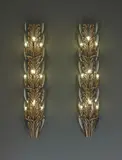 Pair of large wall lights by Pietro Chiesa, circa 1938, Partially-mirrored glass, gilt and silvered wood, brass, original fabric shades (not illustrated), sold Dec 2016