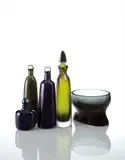 Four decanters and a bowl by Toni Zuccheri and Flavio Poli Paolo Venini, 1946-1966, Inciso glass, giada glass, sommerso glass, sold Dec 2016