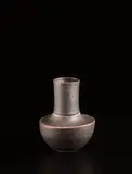 Small vase by Lucie Rie, circa 1960, Porcelain, manganese glaze with sgraffito design on the shoulder, sold Dec 2016