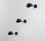 Set of three "Œil" wall lights by Serge Mouille, circa 1956, Painted aluminum, painted steel, brass, sold Dec 2016