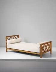 "Croisillon" bed by Jean Royere, circa 1955, Oak-veneered wood, fabric, sold Dec 2016