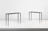 Jean-Michel Frank, Pair of console tables, circa 1938, Painted iron, leather-covered wood