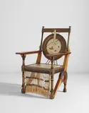 Carlo Bugatti, Armchair, circa 1898, Walnut, ebonized wood, repoussé copper, brass, pewter, painted parchment, silk cord