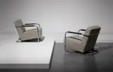 Robert Mallet-Stevens, Pair of armchairs from the apartment building at 7, rue Méchain, Paris, circa 1929, Chromium-plated steel, painted wood, fabric