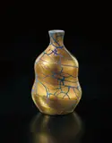 Unique vase by Karl Hansen Reistrup and Herman August Kähler, circa 1897, Ceramic, sapphire blue luster glaze with applied gold leaf, sold Dec 2016