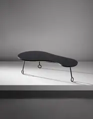"Yo-yo" coffee table by Jean Royere, circa 1957, Formica-covered wood, painted steel, sold Dec 2016