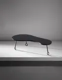 Jean Royere, "Yo-yo" coffee table, circa 1957, Formica-covered wood, painted steel